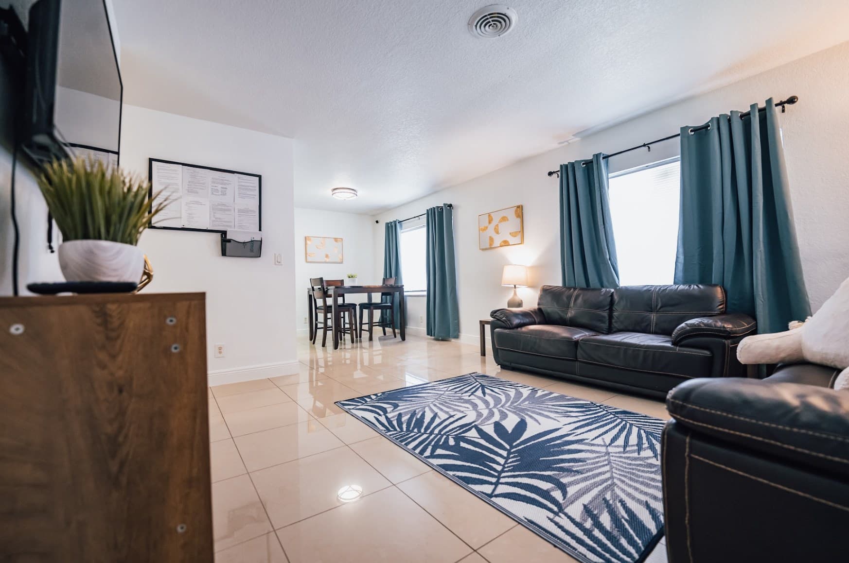 Spacious living and dining area in our South Florida sober living home