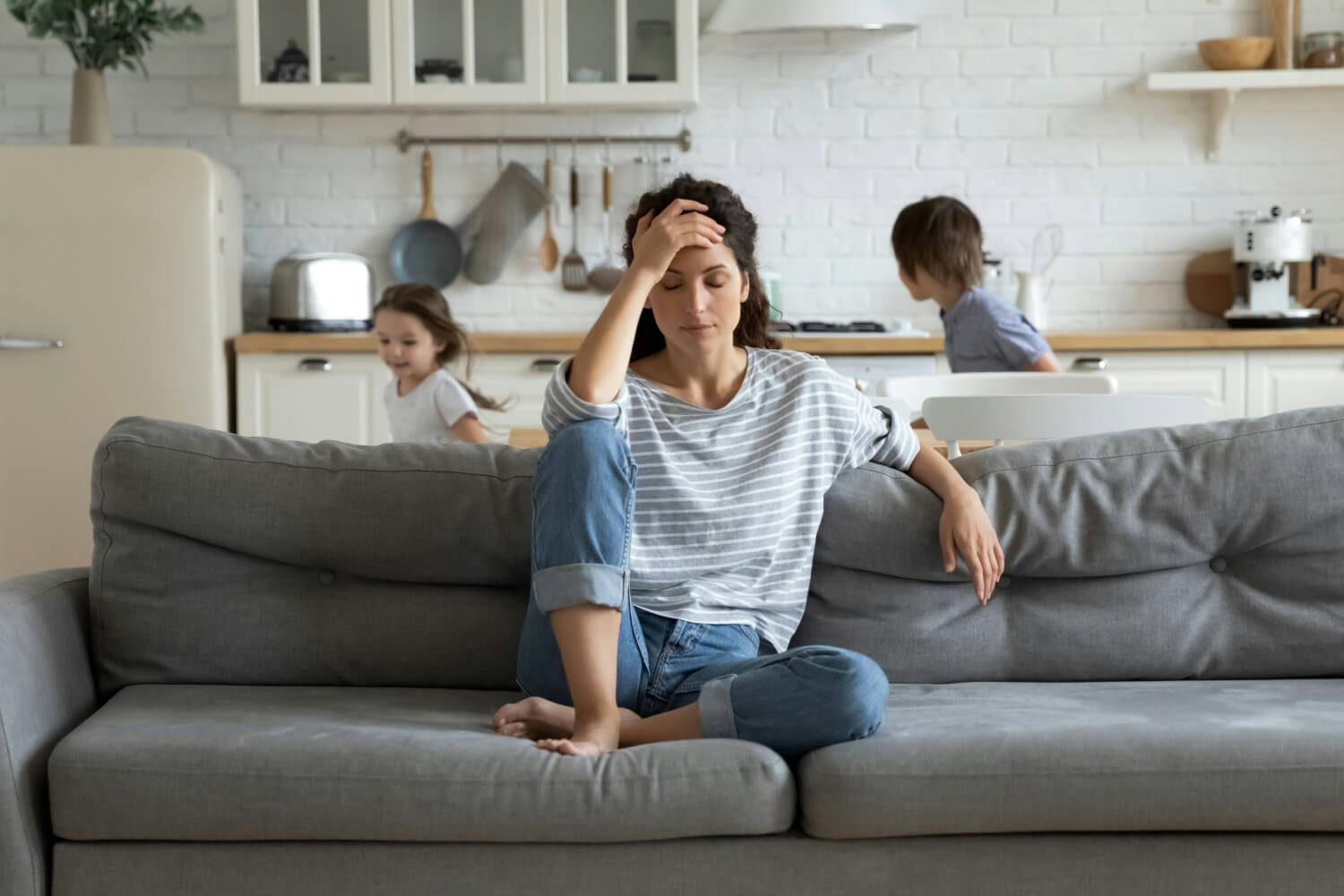 Woman stressed with kids