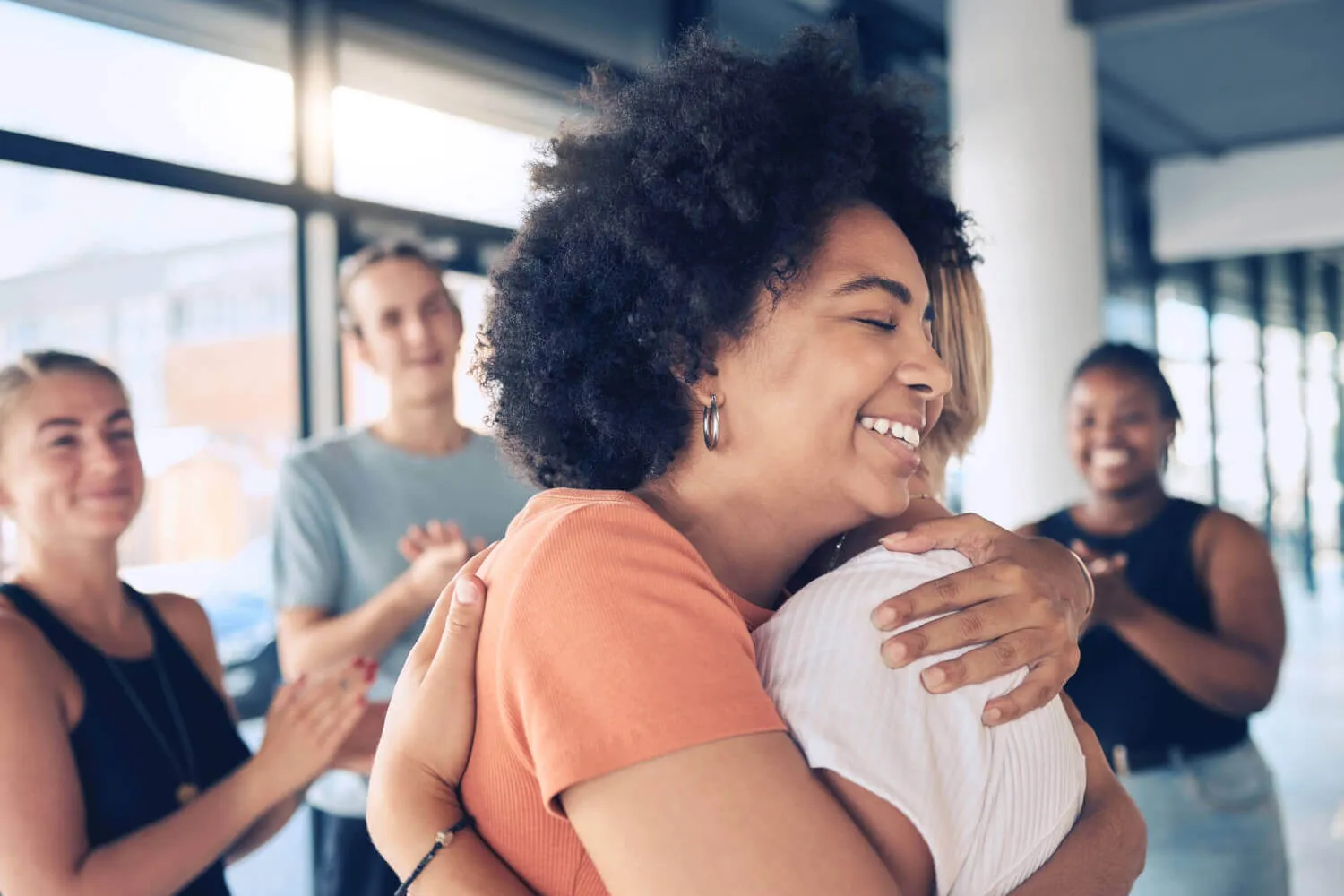 Women hugging each other